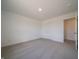 Bedroom featuring neutral carpet and a closet at 5540 Tart Blvd, Indianapolis, IN 46239