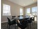 Conference room featuring a large table, chairs, and natural light from large windows at 5540 Tart Blvd, Indianapolis, IN 46239