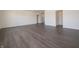 Large living area with sleek flooring, providing ample space for relaxation and entertaining at 5540 Tart Blvd, Indianapolis, IN 46239