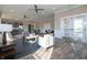 Bright lounge area featuring contemporary furnishings, a modern kitchen, and lots of natural light at 5540 Tart Blvd, Indianapolis, IN 46239