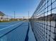 Close-up of tennis court net and court surface in a beautiful setting at 5540 Tart Blvd, Indianapolis, IN 46239