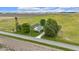 Aerial view of a home with a large lot surrounded by green fields at 5855 S 25 W, Lebanon, IN 46052