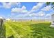 Large, fenced backyard featuring a green lawn, ideal for pets, children, and entertaining guests at 5855 S 25 W, Lebanon, IN 46052