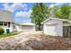 Detached garages with a gravel driveway, offering parking and storage solutions at 5855 S 25 W, Lebanon, IN 46052
