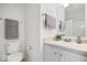 Charming bathroom with elegant fixtures, vanity, sink, mirror, and fresh towels at 5893 Crosscut Ln, Noblesville, IN 46062