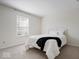 Cozy bedroom featuring soft carpeting and a comfortable bed with plush bedding at 5893 Crosscut Ln, Noblesville, IN 46062