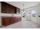 Spacious kitchen with an island, wood cabinets, and stainless steel appliances at 5893 Crosscut Ln, Noblesville, IN 46062