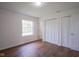 Neutral bedroom featuring two closets and one window at 5938 Dunseth Ct, Indianapolis, IN 46254