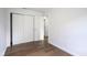 Minimal bedroom featuring hardwood floors and a closet at 5938 Dunseth Ct, Indianapolis, IN 46254
