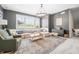 Cozy bonus room with large windows, plush carpet and stylish furnishings at 5990 Hollow Ct, Bargersville, IN 46106