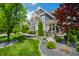 Stunning curb appeal with lush landscaping, stone accents, and a well-maintained front yard at 5990 Hollow Ct, Bargersville, IN 46106
