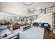 Expansive living room with an open floor plan, staircase, and elegant decor at 5990 Hollow Ct, Bargersville, IN 46106