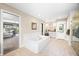 Bright and airy main bathroom with a tub and double vanity at 5990 Hollow Ct, Bargersville, IN 46106