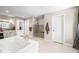 Inviting main bathroom featuring a walk-in shower and a large soaking tub at 5990 Hollow Ct, Bargersville, IN 46106