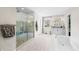 Luxurious main bathroom with glass shower, soaking tub, and double vanity at 5990 Hollow Ct, Bargersville, IN 46106