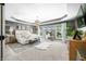 Beautiful main bedroom boasting tray ceilings and ample natural light from large windows at 5990 Hollow Ct, Bargersville, IN 46106