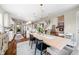Spacious open concept kitchen, dining and living area with hardwood floors at 5990 Hollow Ct, Bargersville, IN 46106