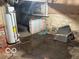 Unfinished basement with a hot water heater at 616 N Exeter Ave, Indianapolis, IN 46222