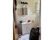 Bathroom featuring single vanity, mirror, and overhead lighting at 616 N Exeter Ave, Indianapolis, IN 46222