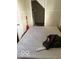 Bedroom featuring carpeted floors and closet space at 616 N Exeter Ave, Indianapolis, IN 46222