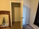 Bedroom with closet and carpeting at 616 N Exeter Ave, Indianapolis, IN 46222
