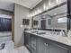 Bathroom features a double sink vanity, large mirror, and modern fixtures at 6494 N Baltimore Rd, Monrovia, IN 46157