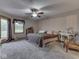 Bedroom with a ceiling fan, neutral walls, and carpeted floors at 6494 N Baltimore Rd, Monrovia, IN 46157