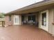 Covered wood deck with chairs and access to the house at 6494 N Baltimore Rd, Monrovia, IN 46157