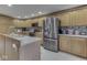 Kitchen view featuring stainless steel refrigerator, countertops, and a sink at 6494 N Baltimore Rd, Monrovia, IN 46157