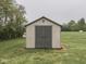 Backyard shed for storage, with room to spare in a large, green, grassy area at 6494 N Baltimore Rd, Monrovia, IN 46157