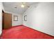 Bedroom with red carpet, white walls, and natural light from two windows at 680 Unity Church Rd, Morgantown, IN 46160