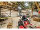 Interior view of outbuilding with exposed beams and ample storage space at 680 Unity Church Rd, Morgantown, IN 46160