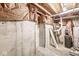 Unfinished basement with concrete foundation and exposed insulation at 6818 Bluffridge Dr, Indianapolis, IN 46278