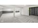 A finished basement featuring carpeting, support beams, and plenty of space at 6818 Bluffridge Dr, Indianapolis, IN 46278