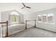 Bonus room with carpet, high ceilings, multiple windows, and wood trim at 6818 Bluffridge Dr, Indianapolis, IN 46278