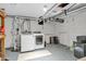 Laundry room with washer and dryer, painted walls, and epoxy flooring at 695 W Clinton St, Danville, IN 46122