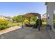 Relaxing backyard patio under a wooden pergola with outdoor seating, perfect for entertaining at 7140 Lakeland Trails Blvd, Indianapolis, IN 46259