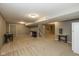 Open basement with neutral walls and carpet, offering a versatile space at 7140 Lakeland Trails Blvd, Indianapolis, IN 46259