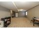 Basement with carpet flooring and natural light, providing a functional multi-purpose space at 7140 Lakeland Trails Blvd, Indianapolis, IN 46259