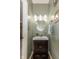 Charming half-bathroom with modern sink and fixtures at 7140 Lakeland Trails Blvd, Indianapolis, IN 46259
