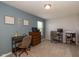 Bedroom with two desks and a window providing natural light for a comfortable workspace at 7140 Lakeland Trails Blvd, Indianapolis, IN 46259