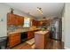 Modern kitchen with stainless steel appliances, sleek countertops, and stylish backsplash at 7140 Lakeland Trails Blvd, Indianapolis, IN 46259