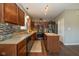 Modern kitchen with stainless steel appliances, sleek countertops, and stylish backsplash at 7140 Lakeland Trails Blvd, Indianapolis, IN 46259