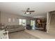 Open living room with a view of the kitchen, neutral decor, and comfortable seating at 7140 Lakeland Trails Blvd, Indianapolis, IN 46259