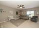 Inviting living room with neutral tones, comfortable seating, and ample natural light at 7140 Lakeland Trails Blvd, Indianapolis, IN 46259