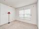 Inviting bedroom features soft carpet, a large window, and comfortable lighting at 725 Bristle Lake Dr, Brownsburg, IN 46112