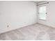 Neat bedroom features neutral carpet, a bright window, and minimal decor at 725 Bristle Lake Dr, Brownsburg, IN 46112