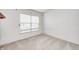Cozy bedroom with neutral carpet and a window, perfect for relaxation at 725 Bristle Lake Dr, Brownsburg, IN 46112