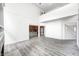 Bright open living space featuring a fireplace, wood floors, and an open floor plan at 725 Bristle Lake Dr, Brownsburg, IN 46112