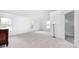 A main bedroom with three large windows, carpet, and an ensuite bathroom at 725 Bristle Lake Dr, Brownsburg, IN 46112